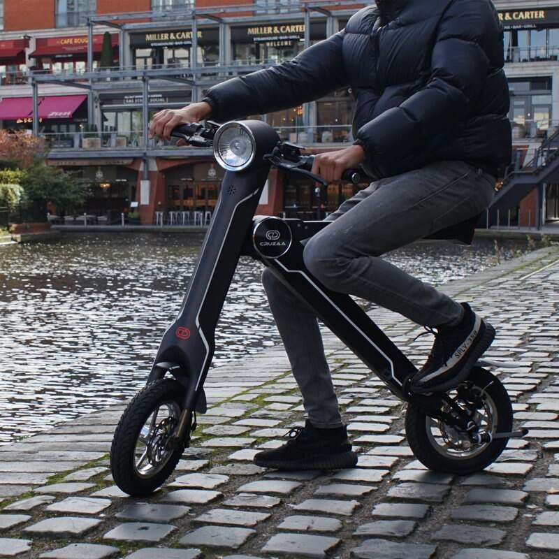 Cruzaa Sit-down E-Scooter with Built-in Speakers & Bluetooth - Foldable - 250W - Carbon Black - AmpTrek